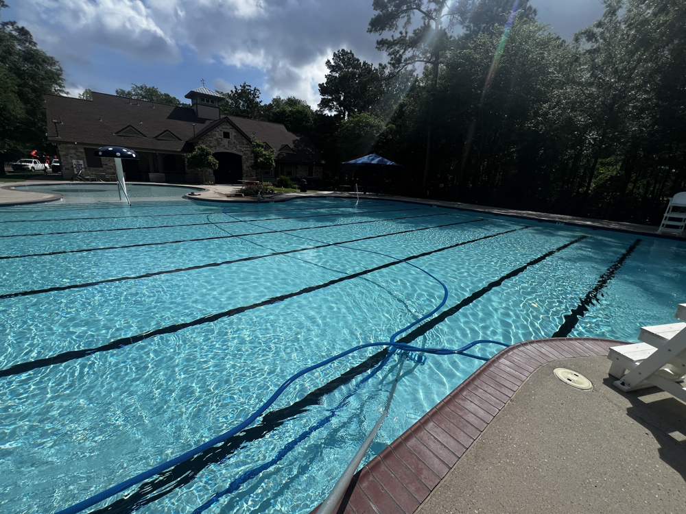 Community pool cleaning by ATX AquaTechs